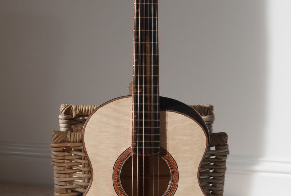 montgomery guitars, 12 fretter, flammed maple, bearclaw spruce, concert, andreas guitar, lacewood